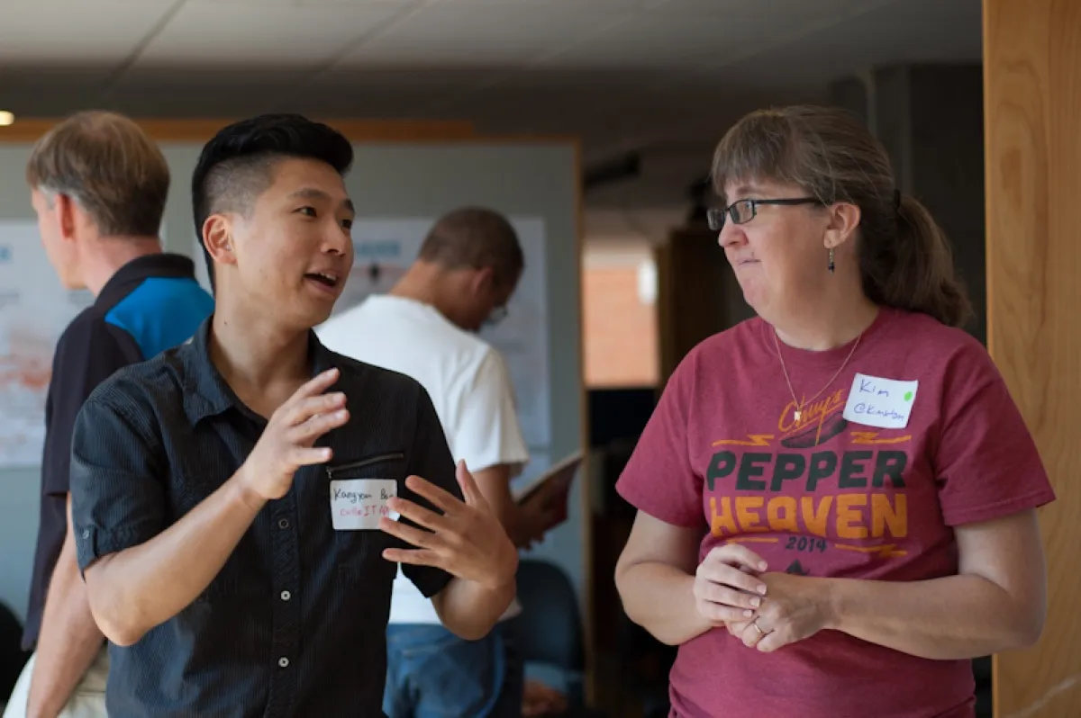 Attendees networking at beCamp