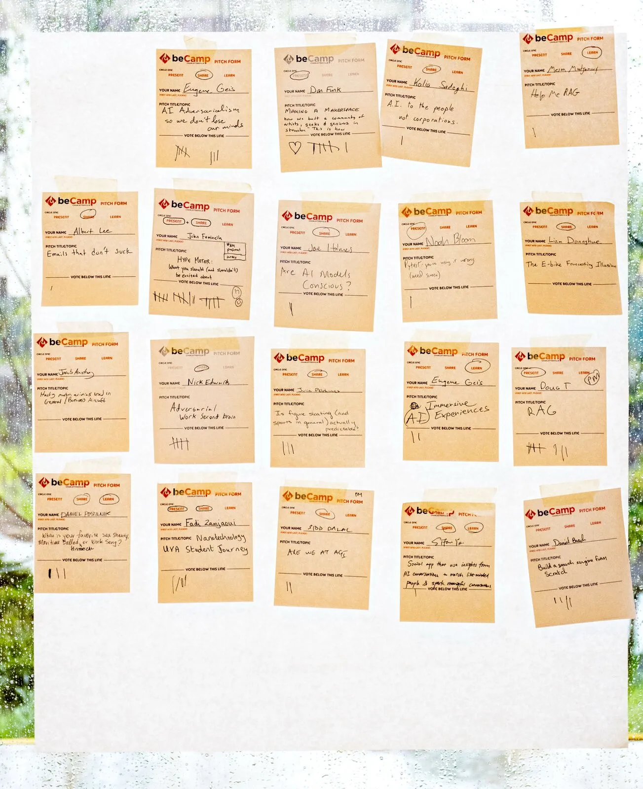 Another section of the pitch board, handwritten pitch cards with tally-mark votes